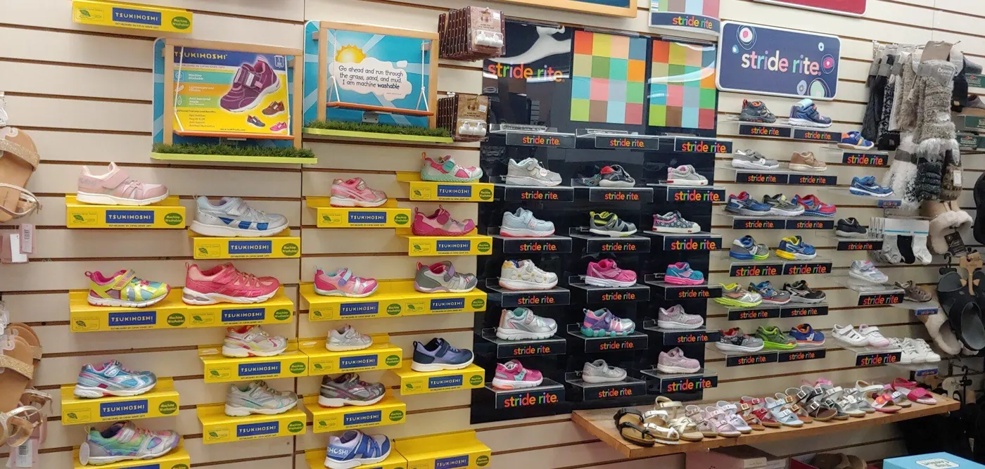Wall of Stride Rite kids' shoes